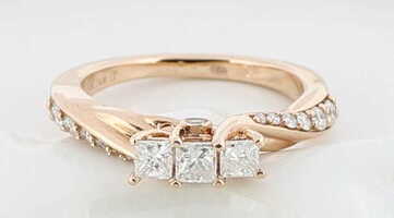 LADIES 14K SOLID ROSE GOLD THREE STONE TWIST SHANK DIAMOND RING