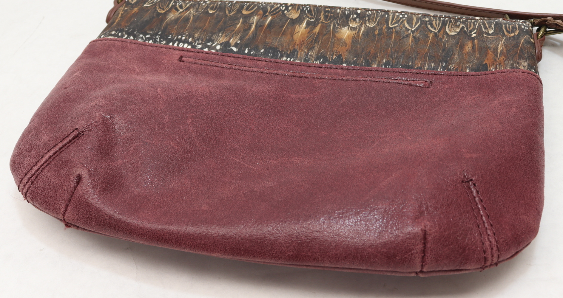 the sac oleta leather burgundy with painted feather trim crossbody 